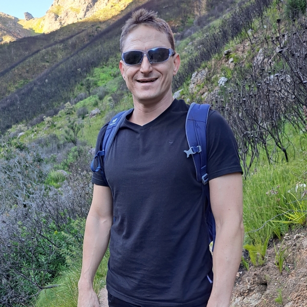 Casper Lotter hiking in the mountains near Cape Town